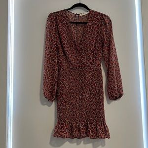 Mini floral dress, smocked/fitted on bottom half.